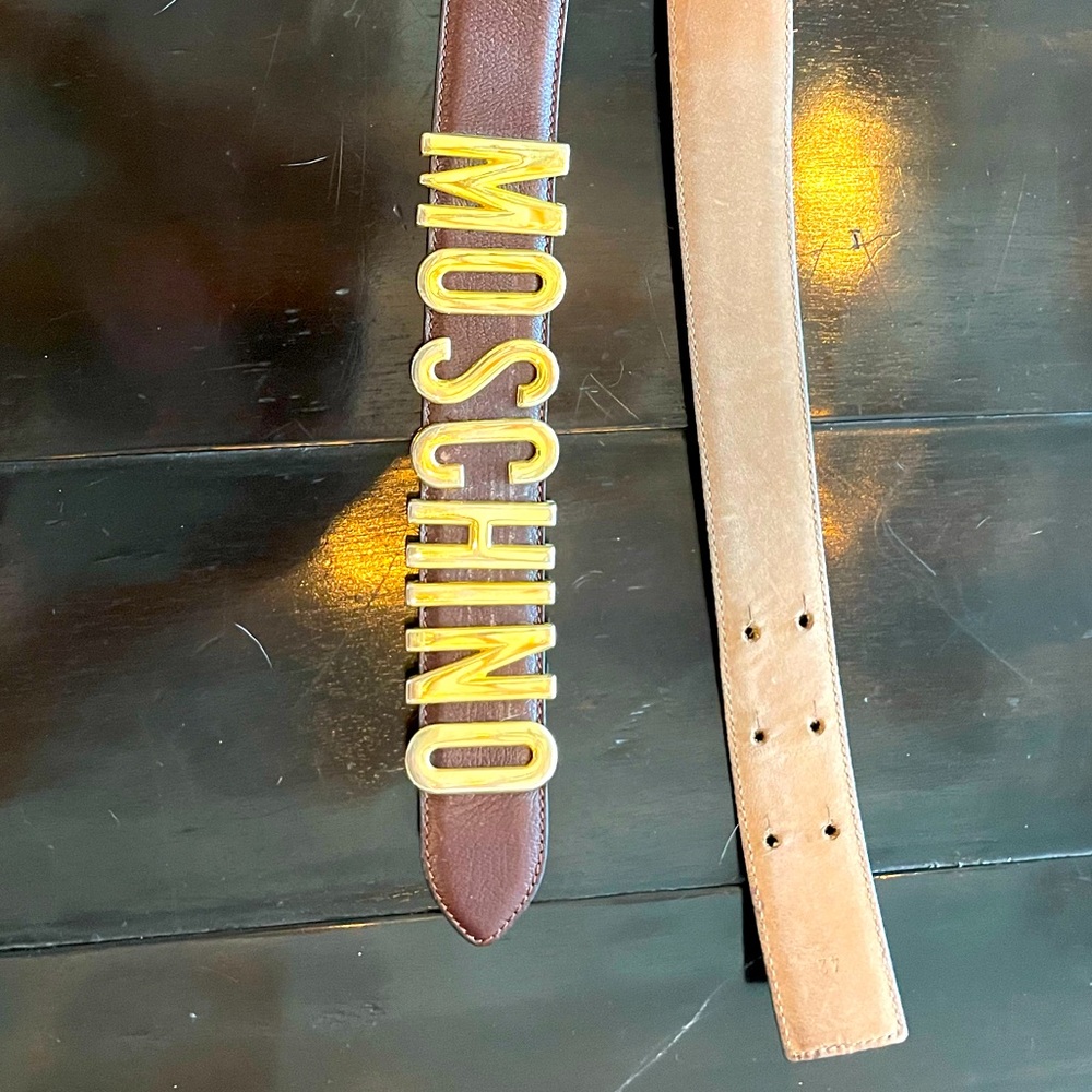 Authentic moschino belt gently worn. Gold letters and brown leather belt